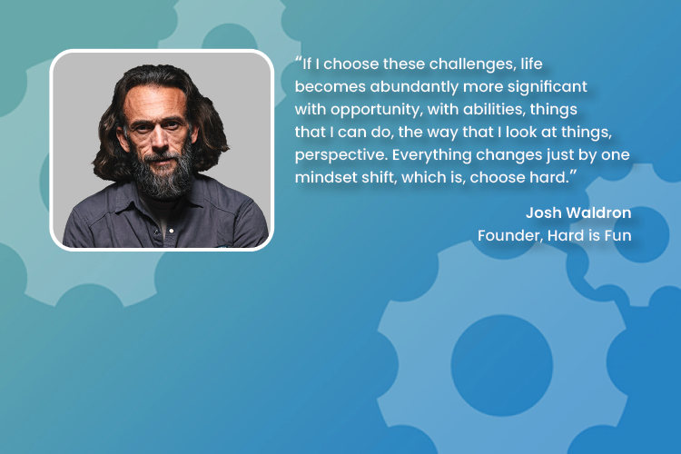 Portrait of a man with medium-length dark hair and a beard, wearing a dark shirt, beside a motivational quote about mindset shifts by Josh Waldron, founder of Hard is Fun, on a blue background with gear graphics.