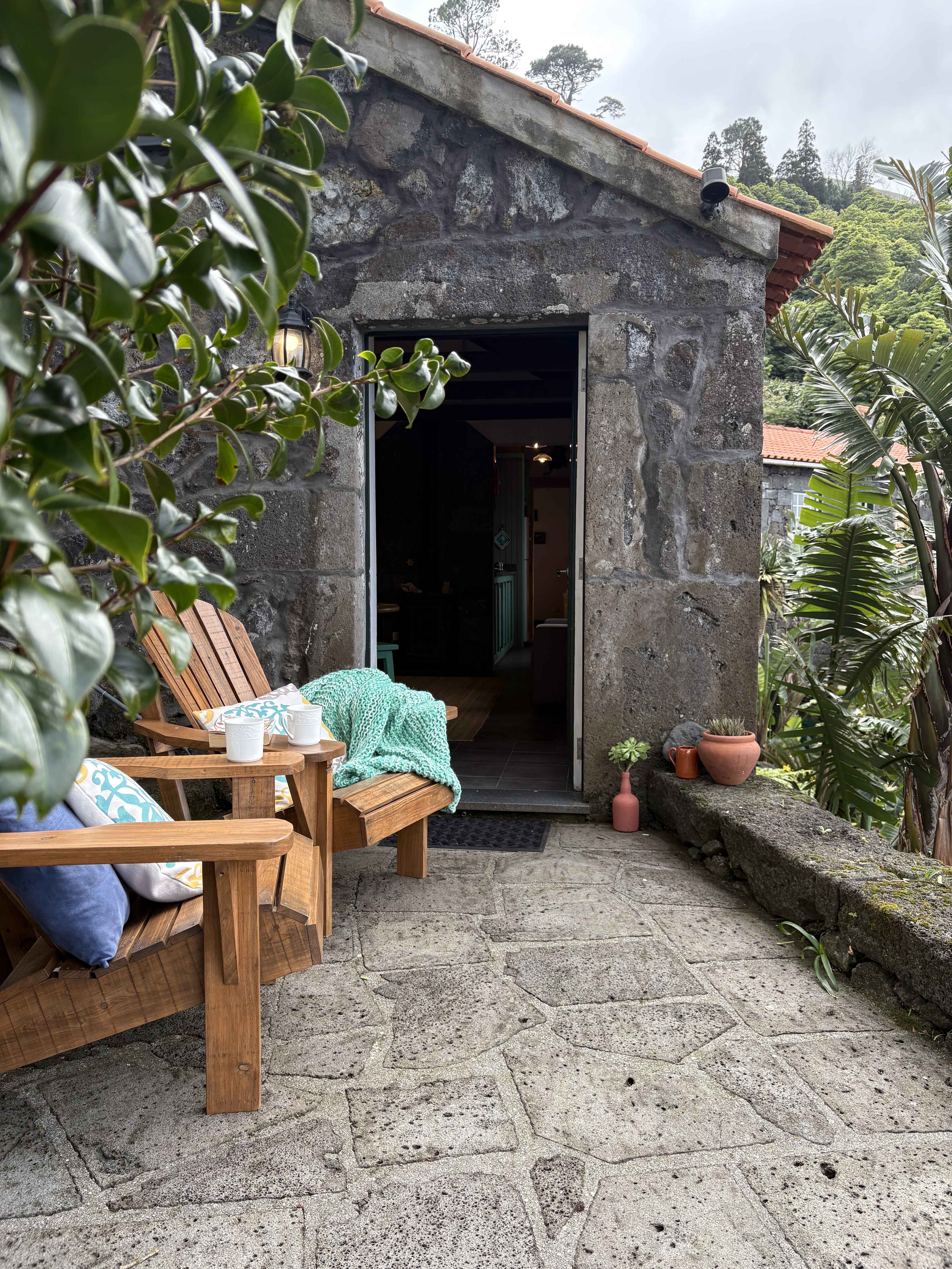 The private patio at Casa do Laureano, a basalt stone cottage in Santo Amaro, Pico