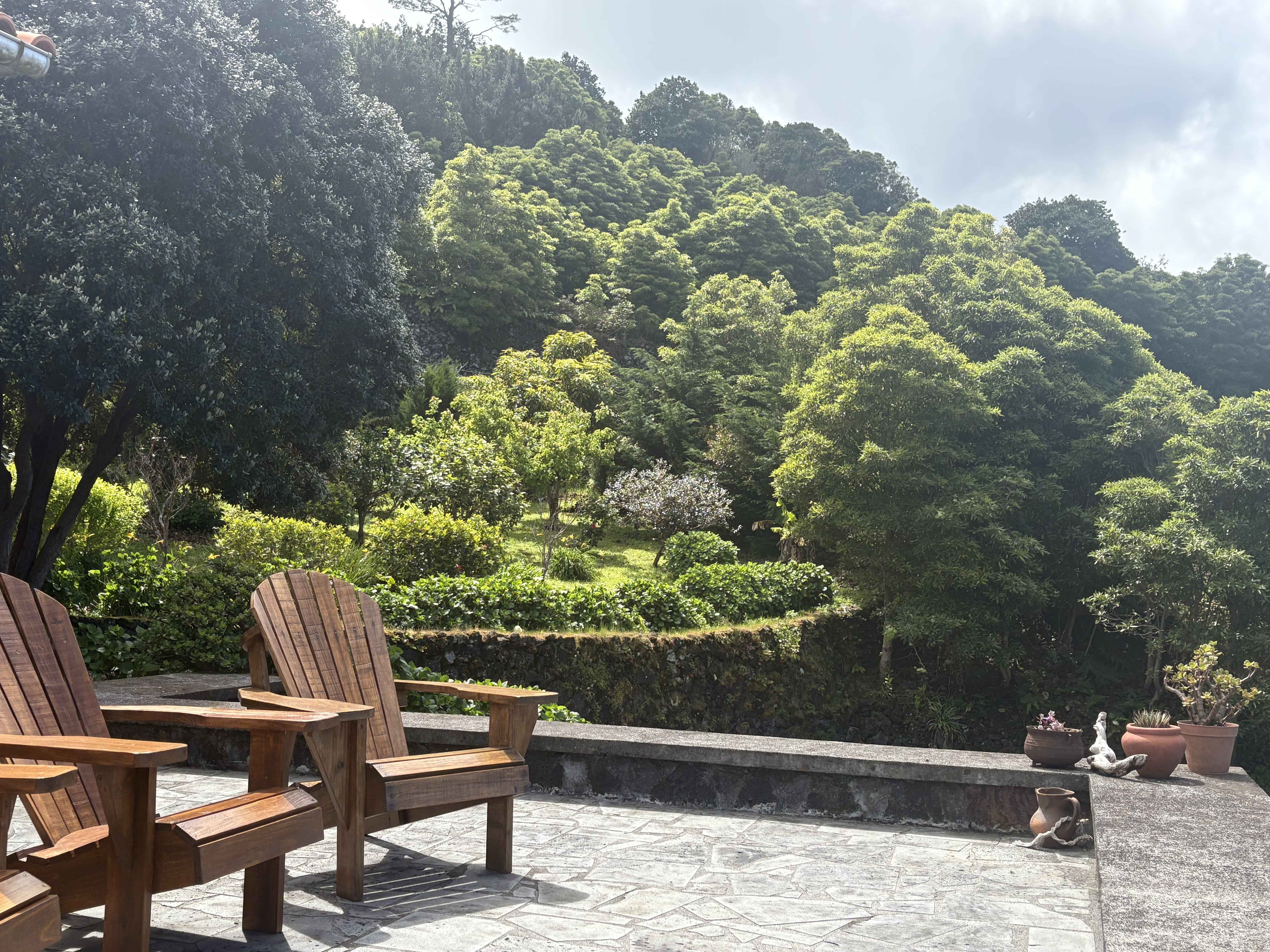 Inside Casa da Terra Alta, a basalt stone home at Highland Homes in Terra Alta, Santo Amaro, Pico
