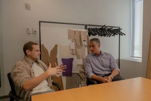 Two men discussing business