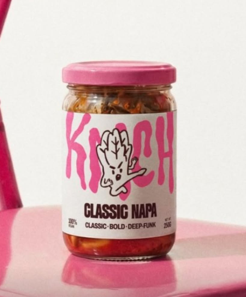 Kimchi jar with a pink lid and hand illustration, labelled Classic Napa