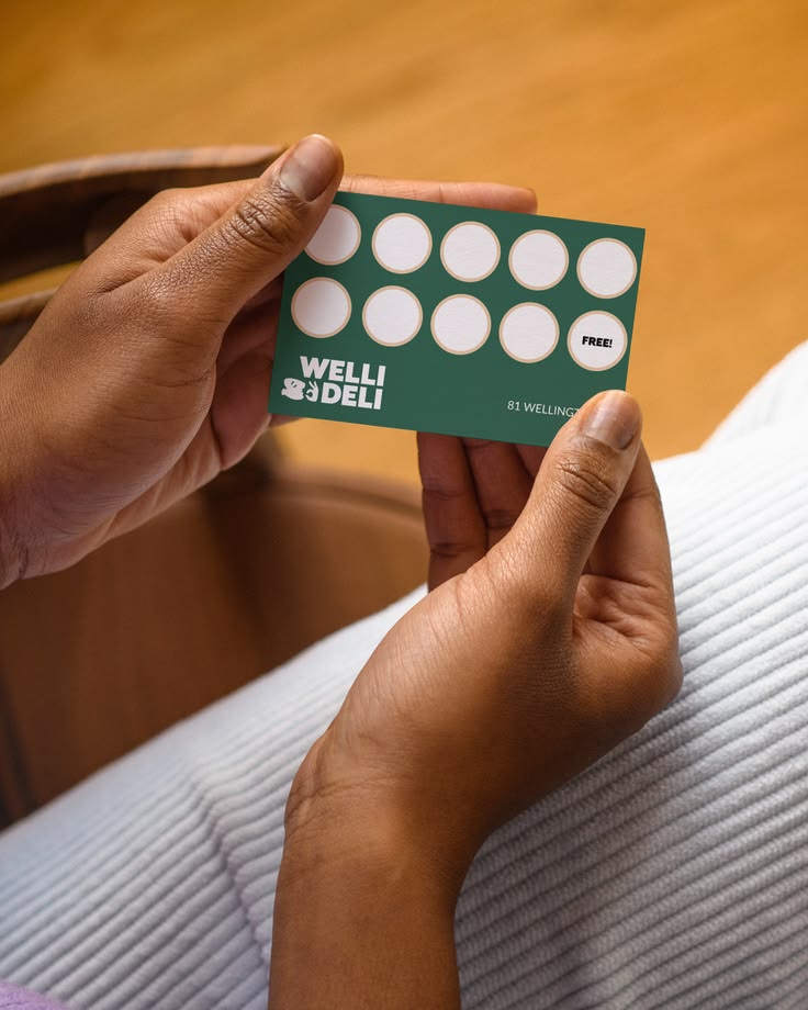Welli Deli is a delicatessen and kitchen brand built to feel warm, characterful and craveable. A brand with personality that shows up consistently across every touchpoint -- from coffee cups and loyalty cards to apparel, packaging and in-store presen