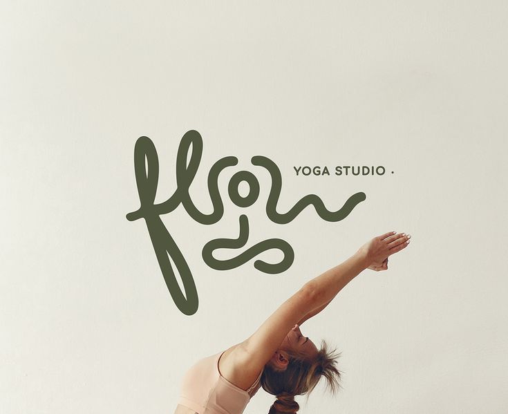 Flow Yoga Studio script logotype set over a soft photograph of a figure stretching