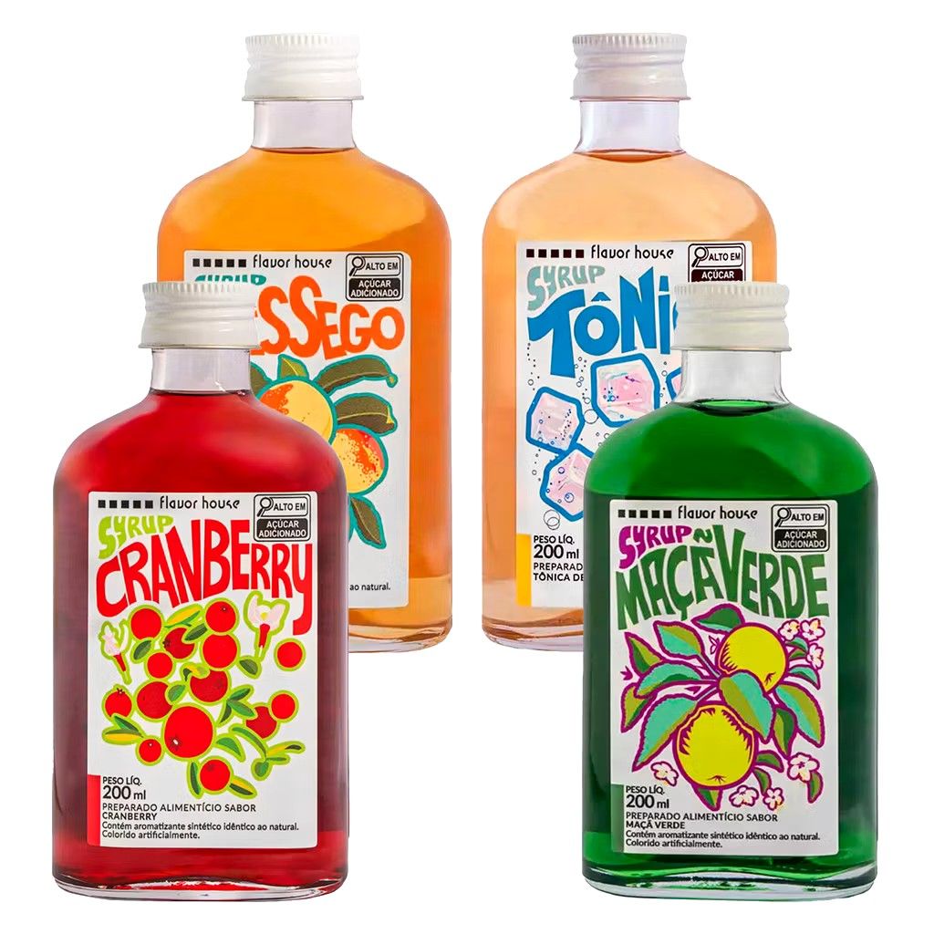 Four syrup bottles with vivid illustrated labels including cranberry and macae verde