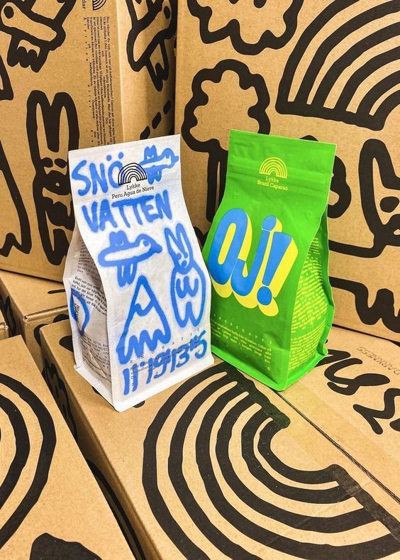 Swedish snack packaging on illustrated timber steps with Sno Vatten and OJ! wordmarks