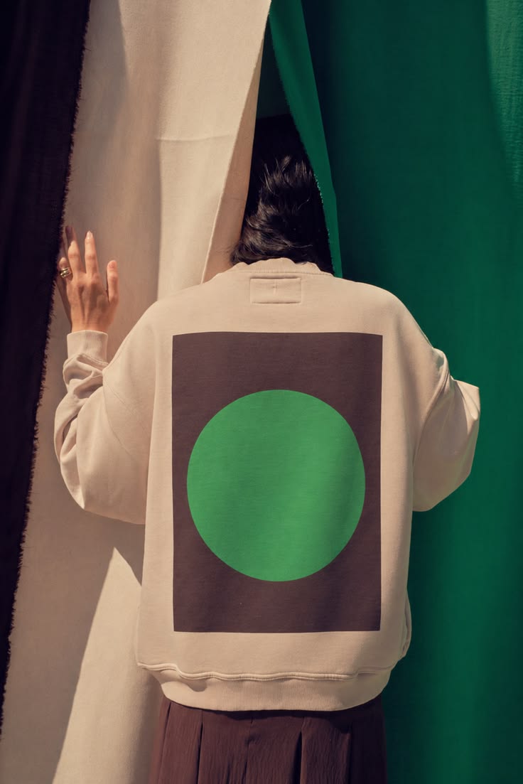The Auguste printed crewneck is now available in our new limited-edition green and brown colorway. This unisex crewneck is made from 100% cotton terry and features a relaxed, perfectly oversized fit. It is detailed with Kitty Cooper’s signature letter “K,” embroidered on the front bottom left in a d