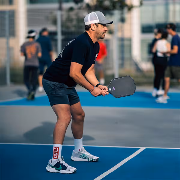 man in the ready position at the kitchen line