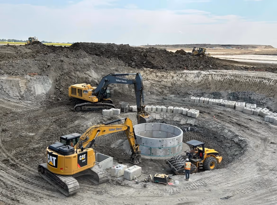 diggers working to build a shaft