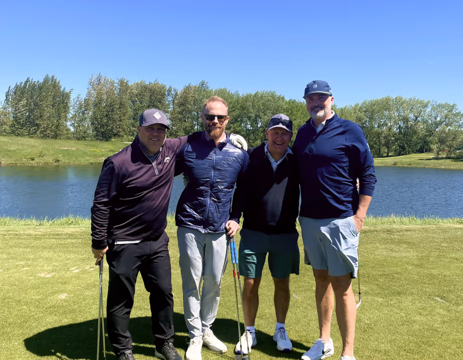 group of 4 golfers