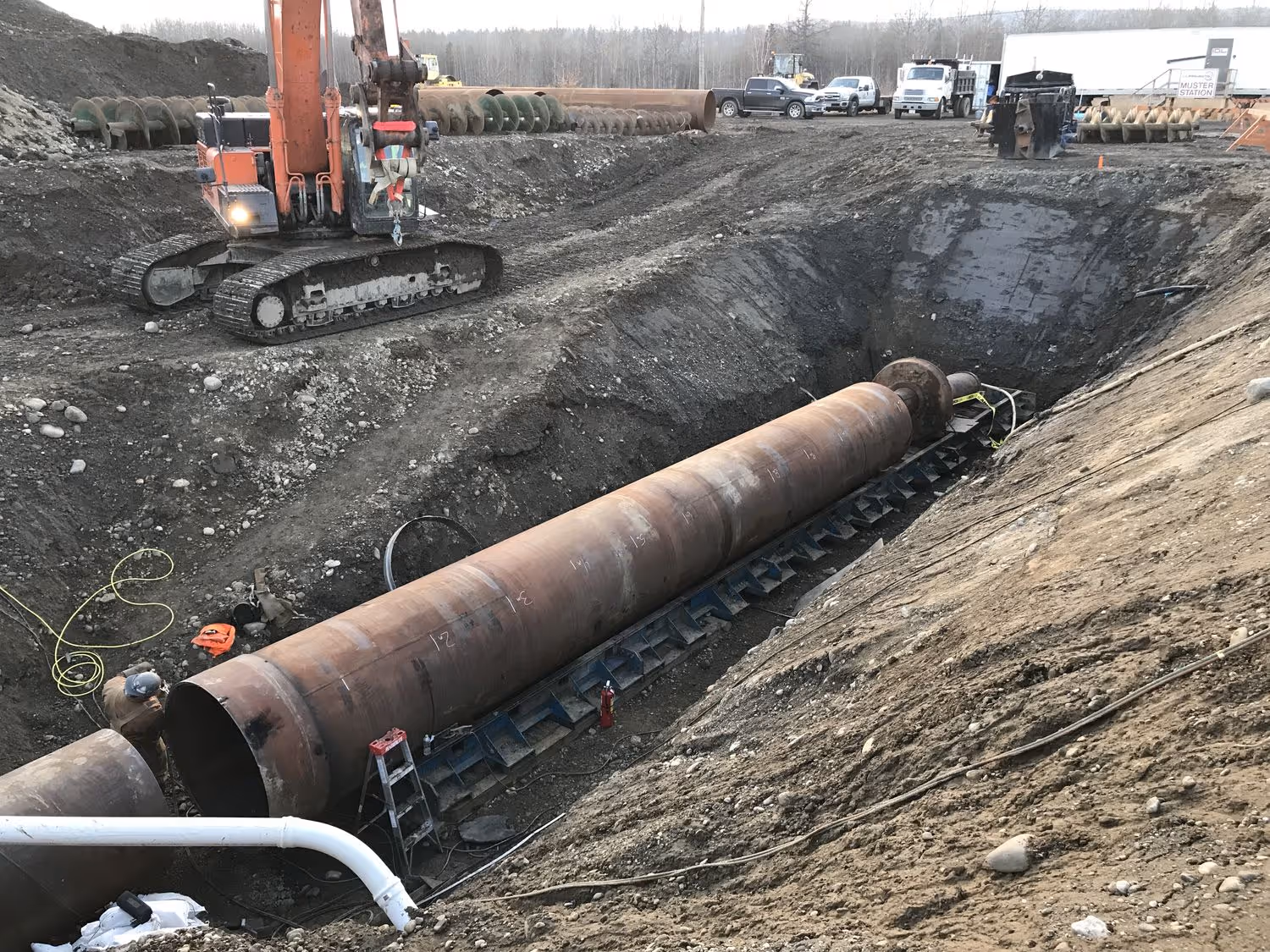 a long pipeline being welded together