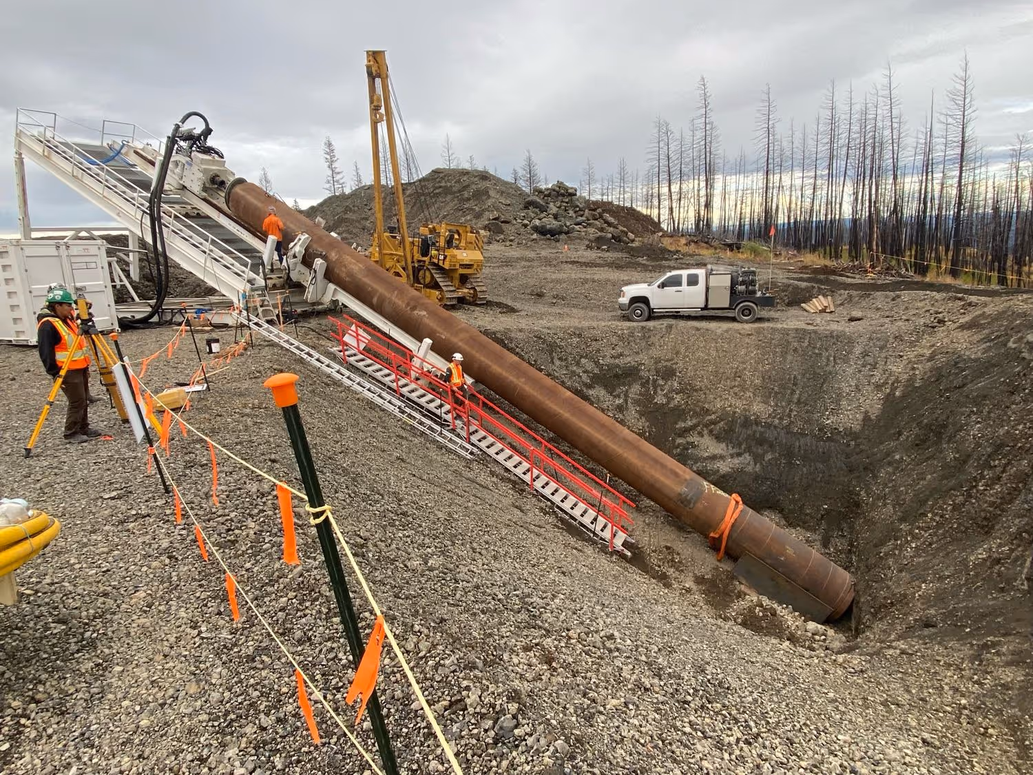 pipeline going into the ground at an extreme angle