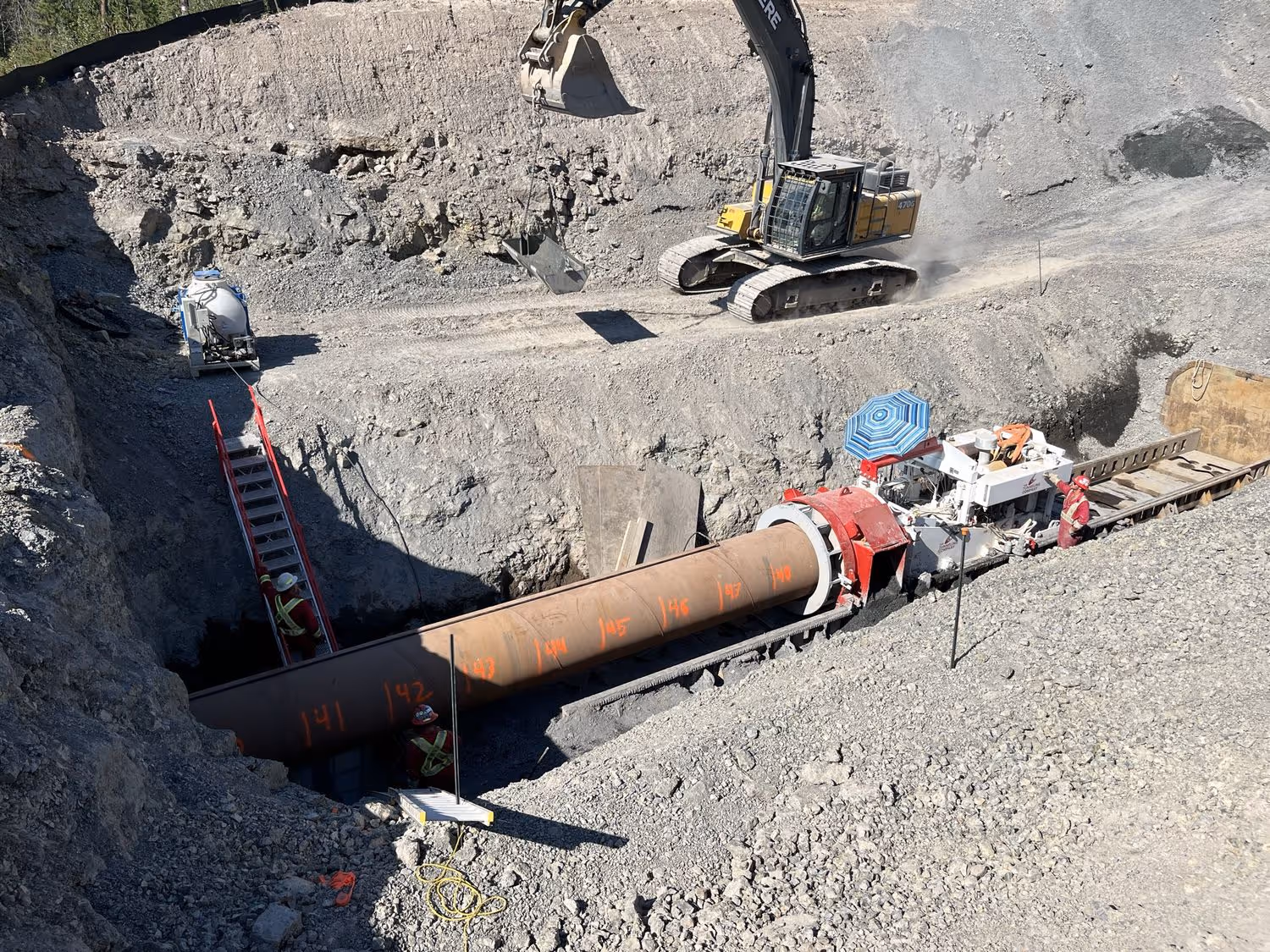 a pipeline is being pushed in horizontally
