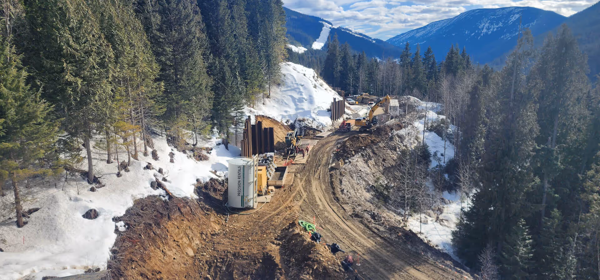 snowy mountains with construction