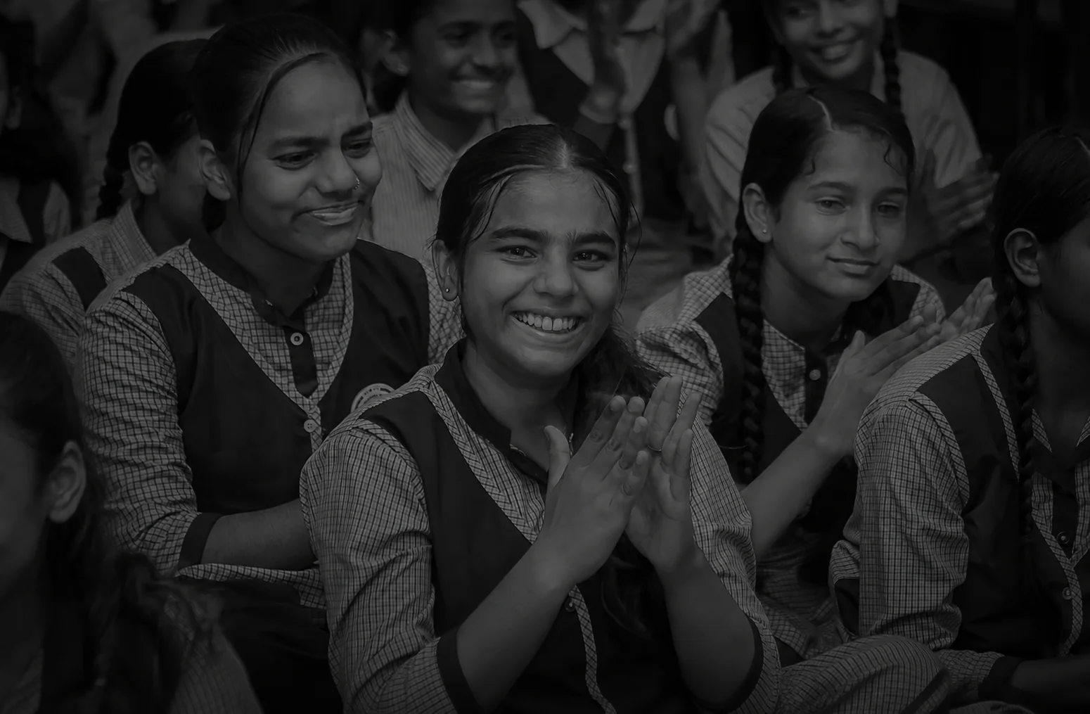 A girl smiling with confidence at school