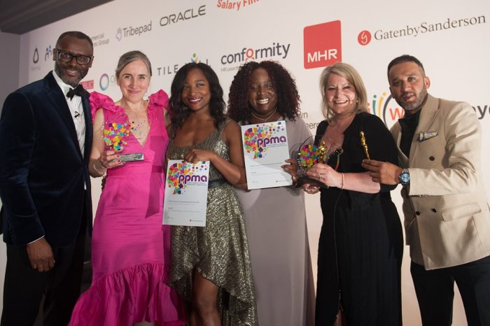 Kingston staff members accepting an award at the PPMA Awards