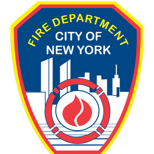Shield emblem of the Fire Department City of New York with a city skyline, red flame, and life ring design.