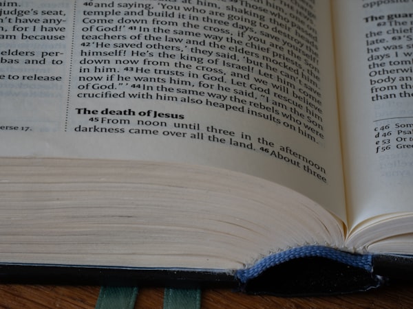 a close up of an open book on a table