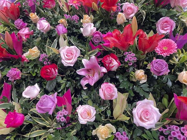 a bunch of flowers that are in a vase