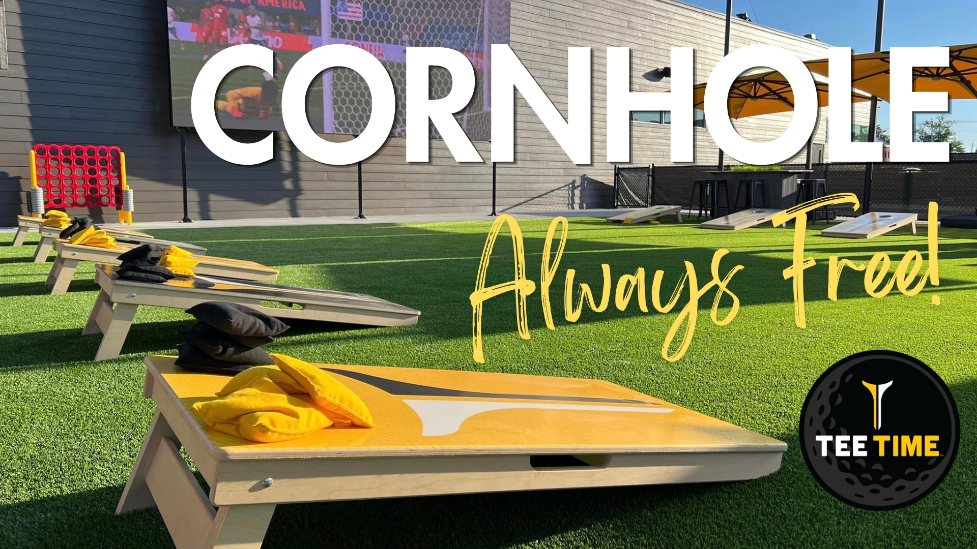 Pictured is TeeTime's outdoor patio that features a big screen TV for watch parties, pickleball courts and of course, cornhole that is always free.