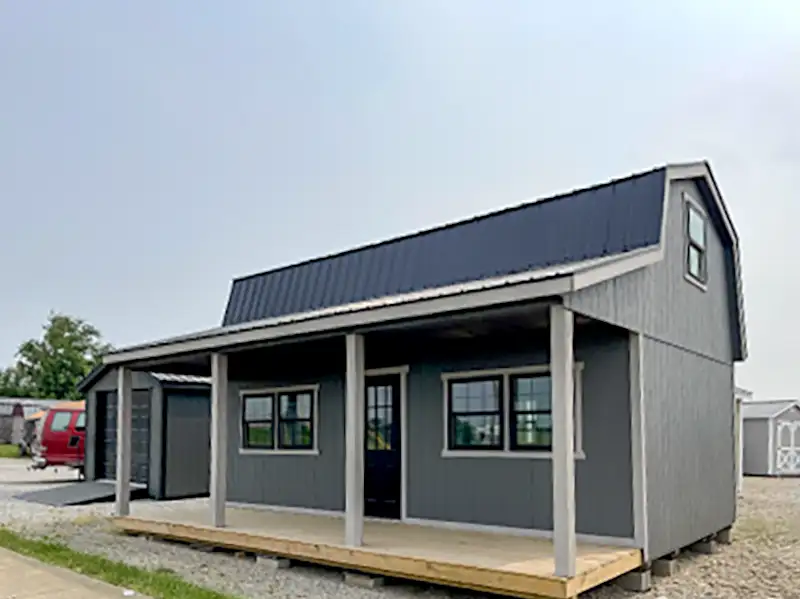 gray cabin with porch