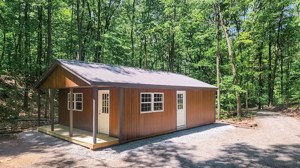 brown smart siding cabin with porch