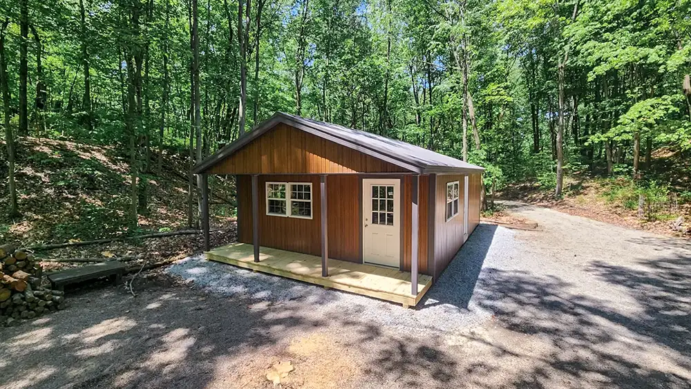 brown smart siding cabin with porch