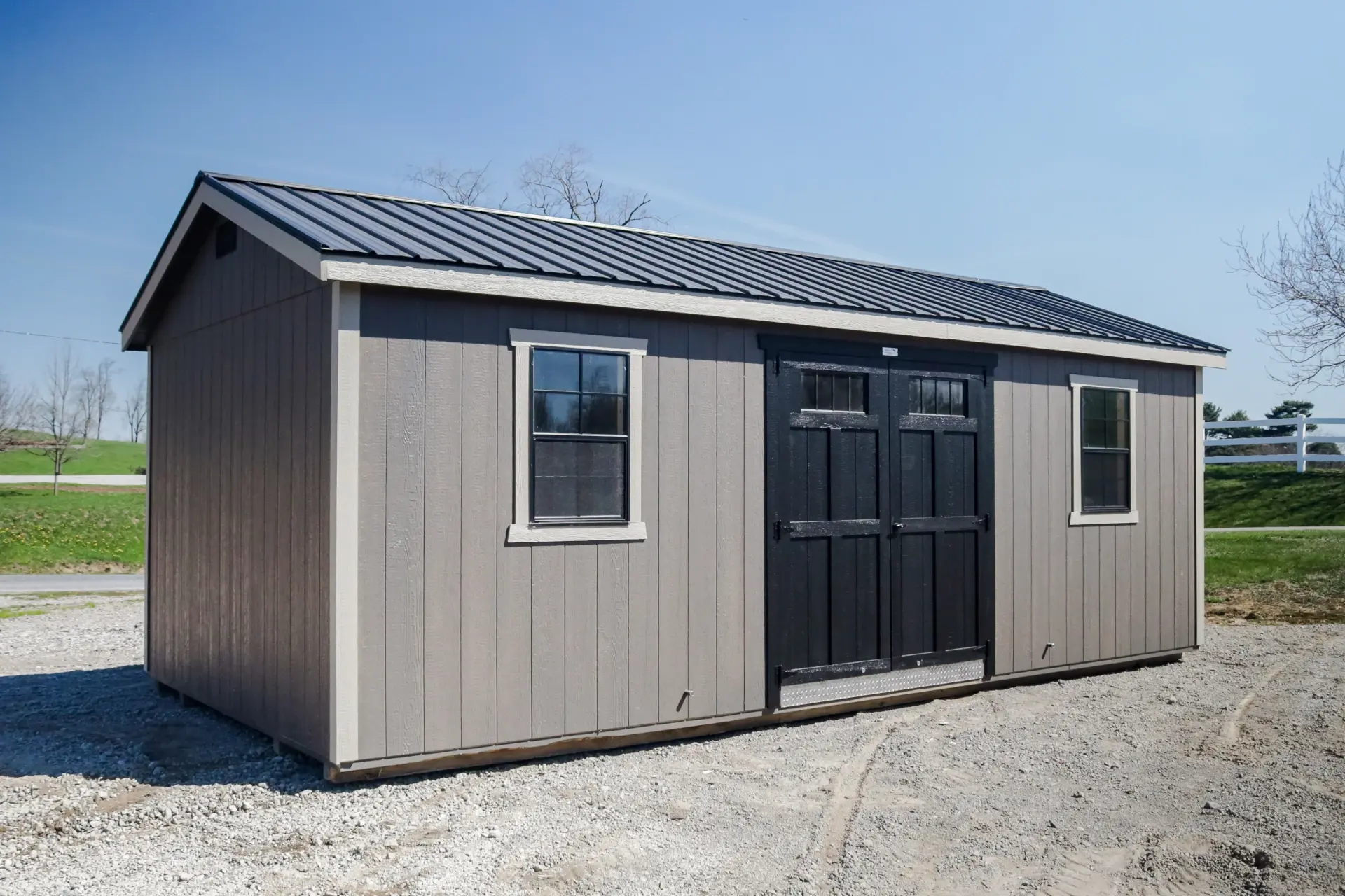 nuhaus shed on gravel lot