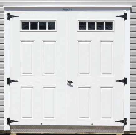 white fiberglass double doors with black handle and black hinges