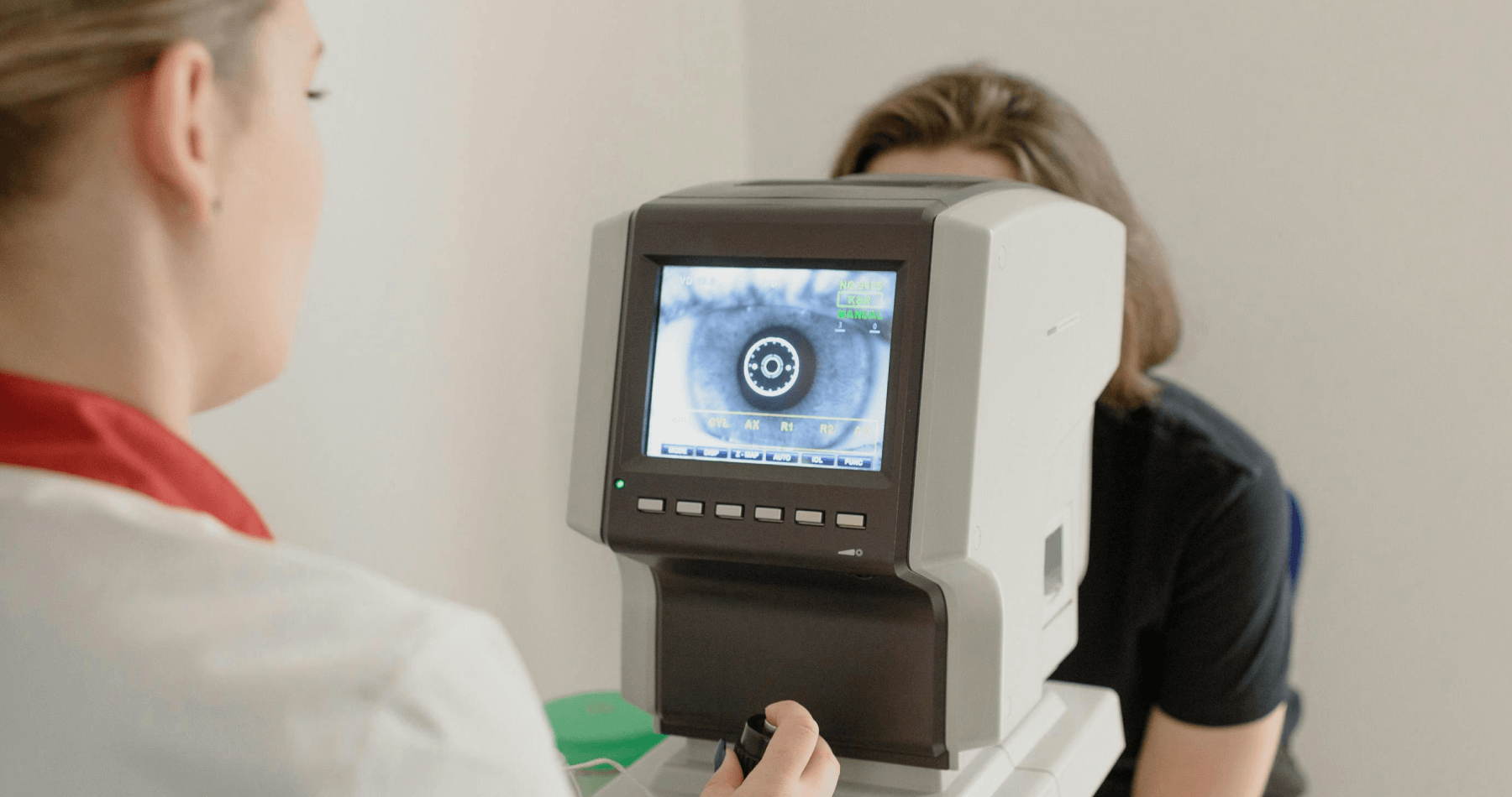 Patient undergoing a digital eye exam with retinal imaging at Eye. Optometry.