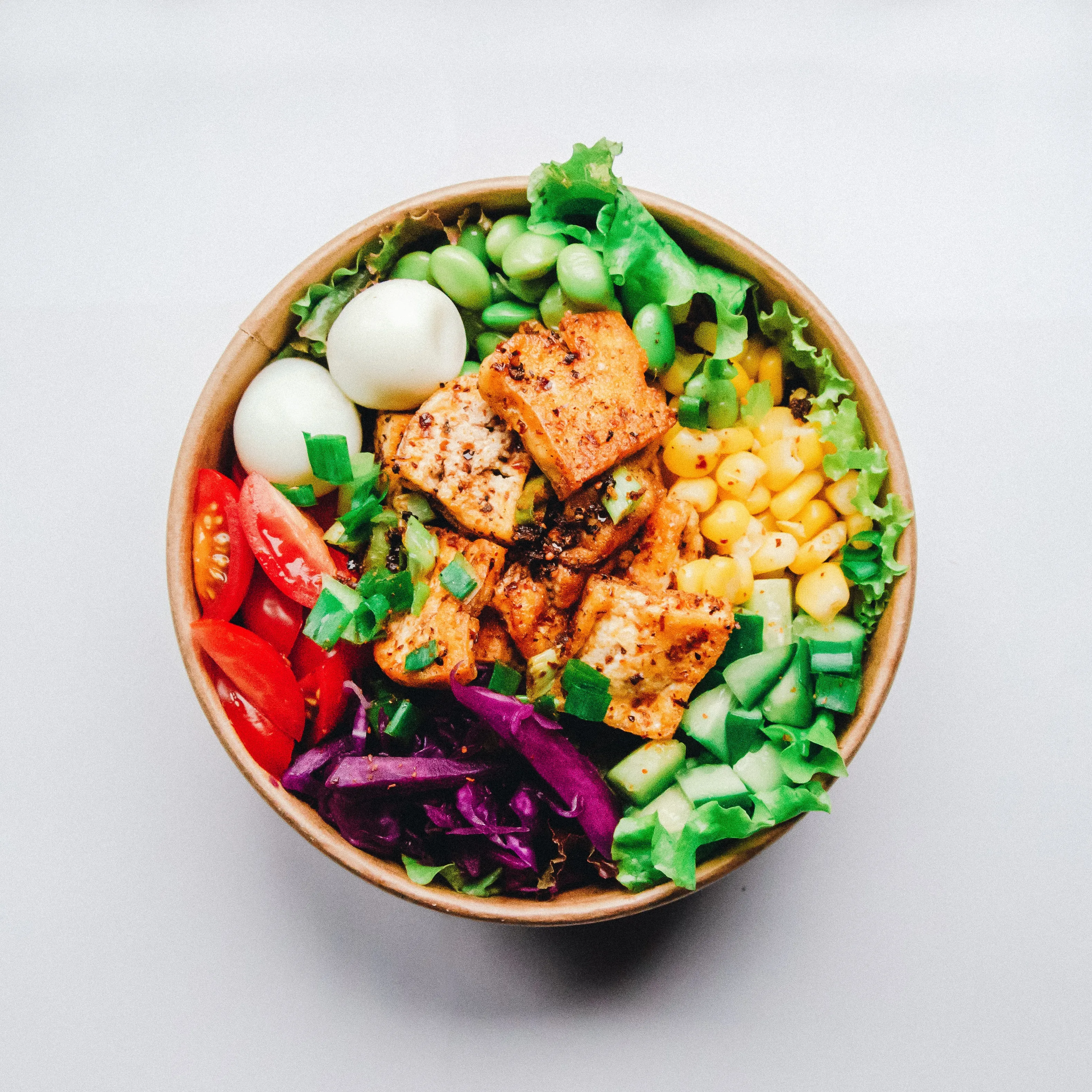 A salmon poke bowl with chickpeas