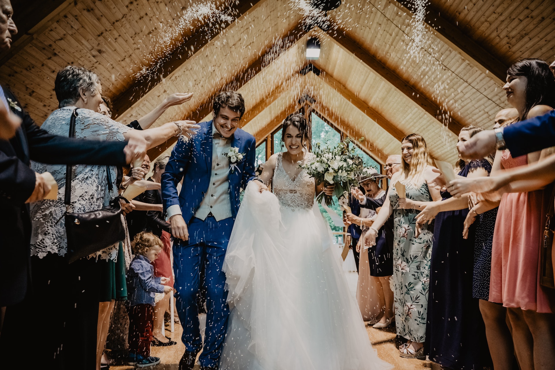 Married couple walking down the aisle