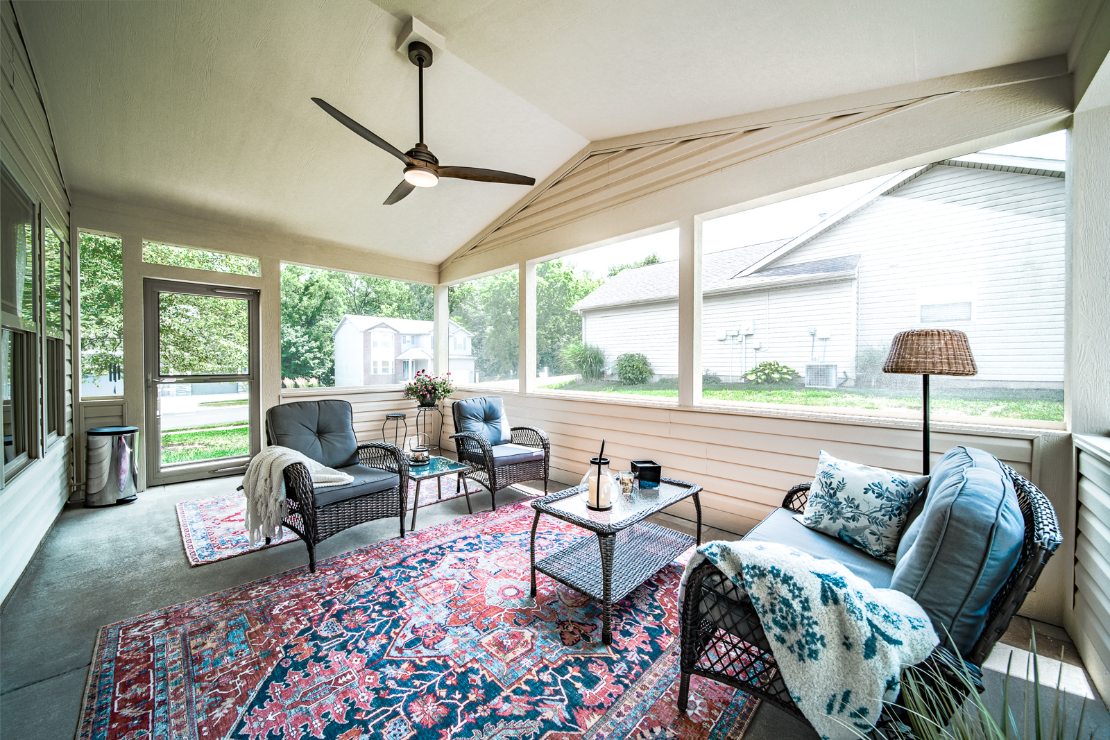 This screened-in porch addition in West Lafayette creates a beautiful, wheelchair-accessible outdoor living space with comfort, airflow, and style.