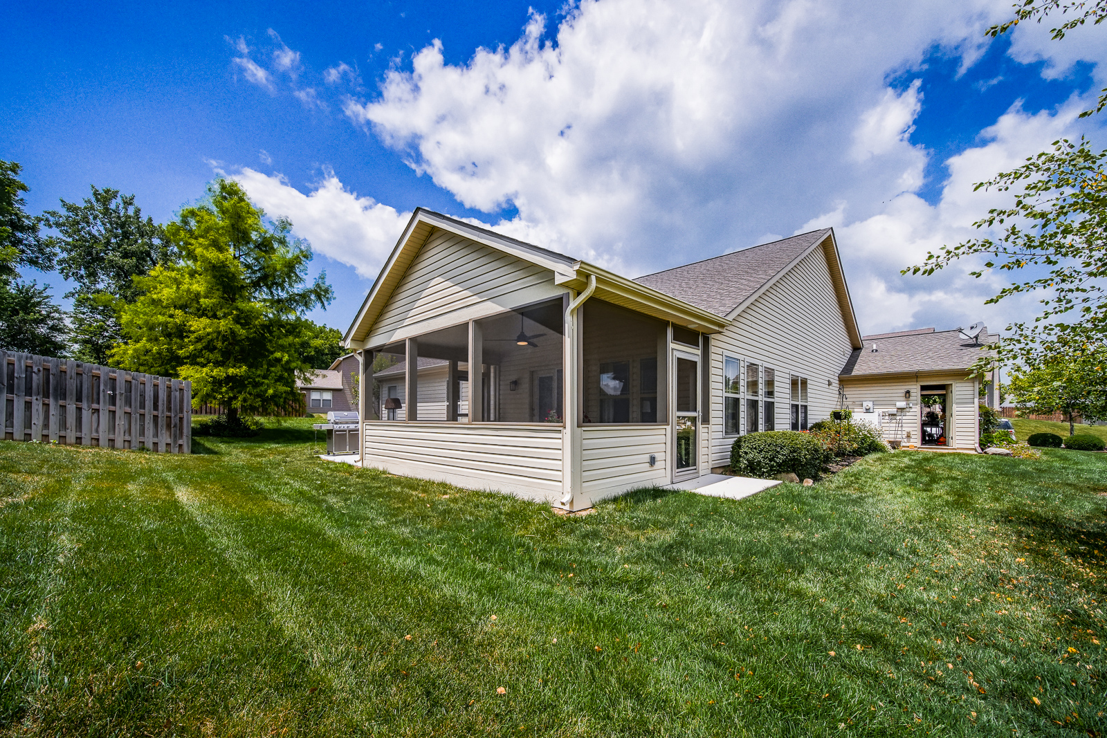 Screened-in porch room addition with wide entry and clear interior access in West Lafayette