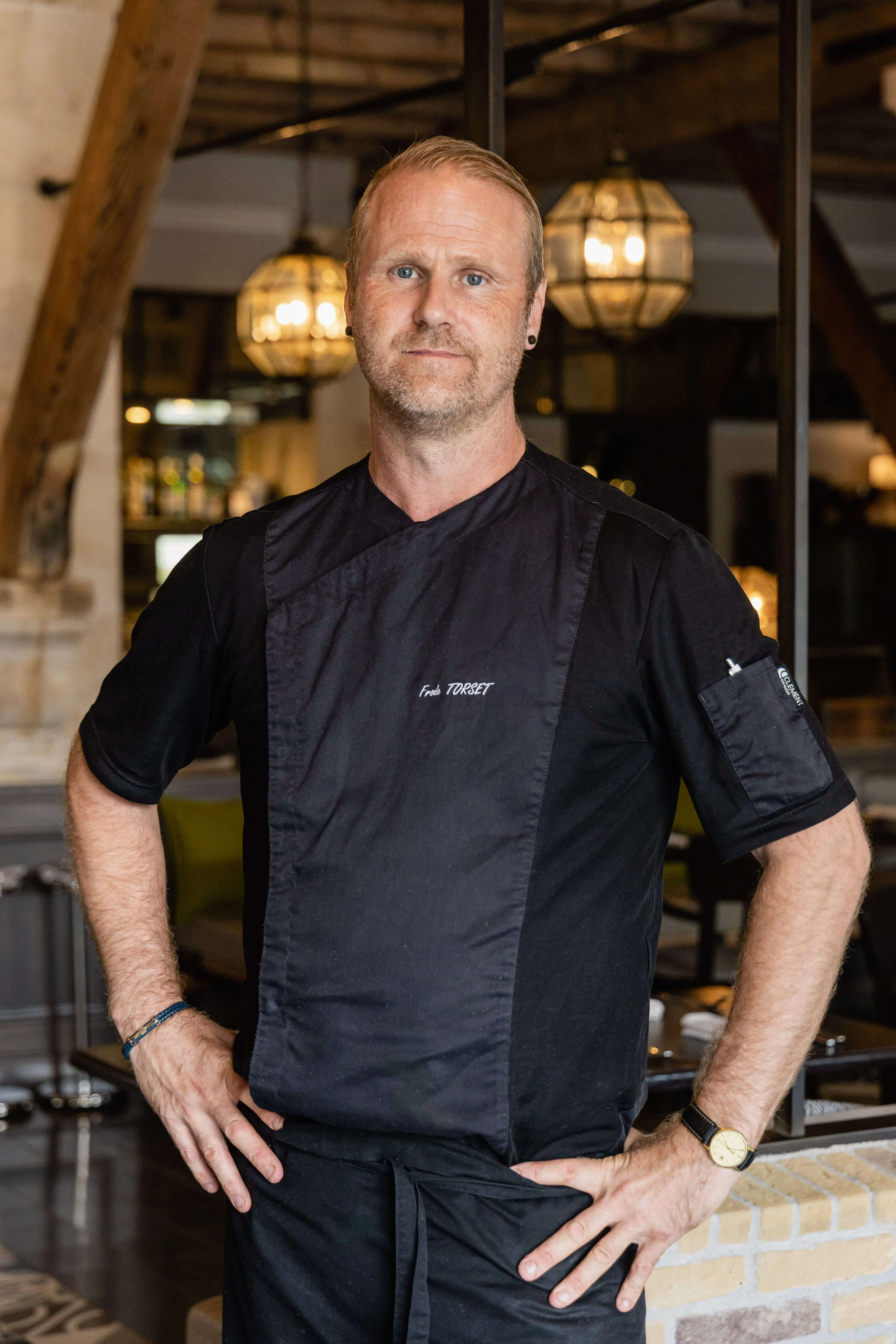 Preparing a dish in the kitchen Hotel Chais Monnet & Spa Cognac