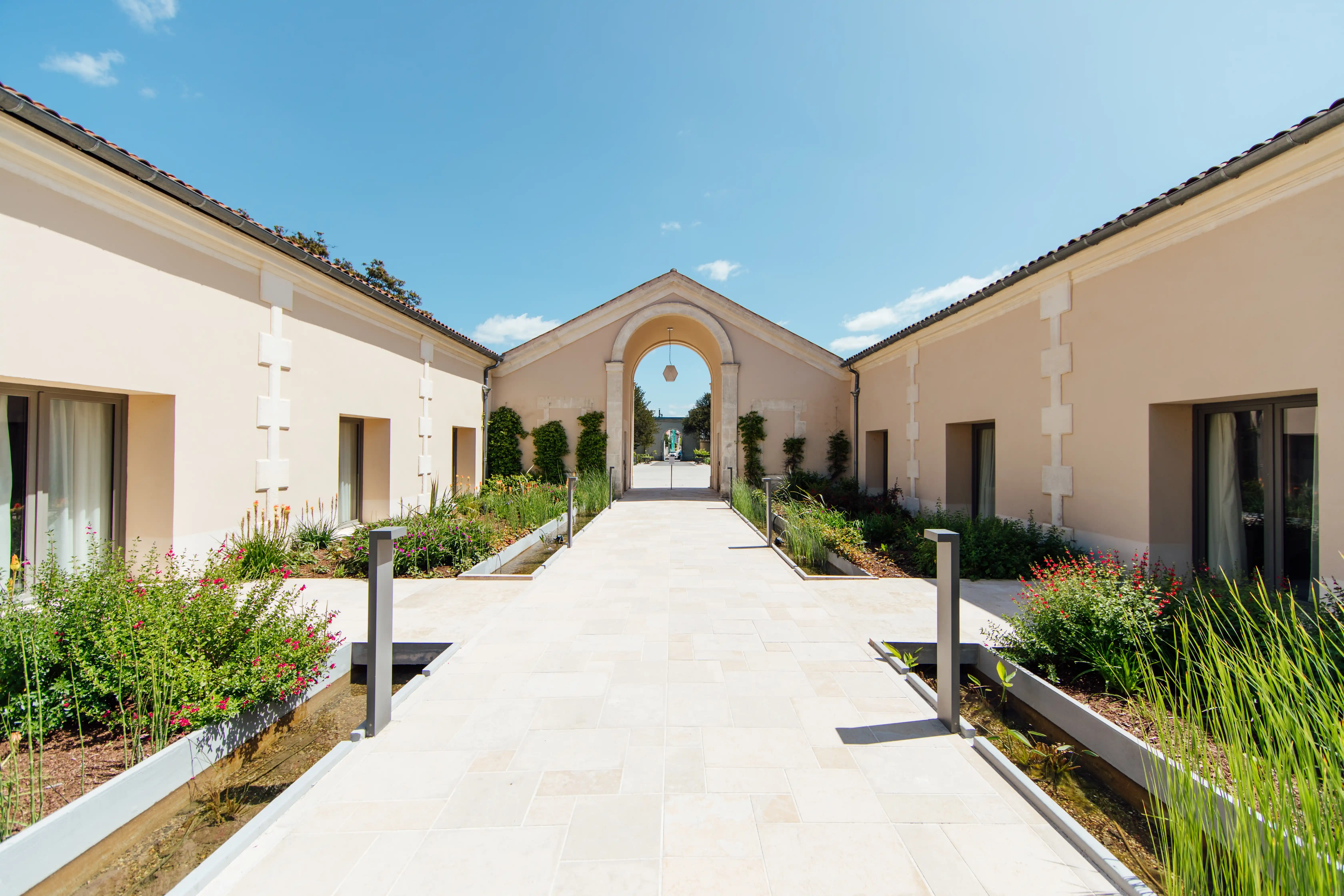 Hotel frontage with luxury car Hotel Chais Monnet & Spa Cognac