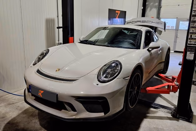A Porsche 911 in a garage