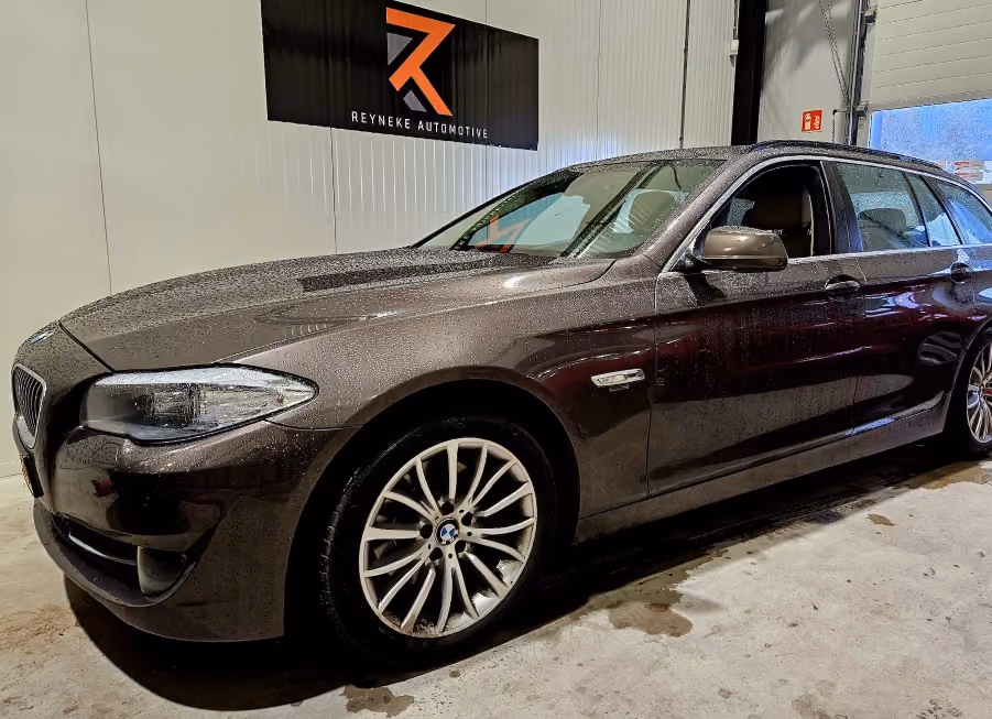 BMW 5-series in a garage for tuning