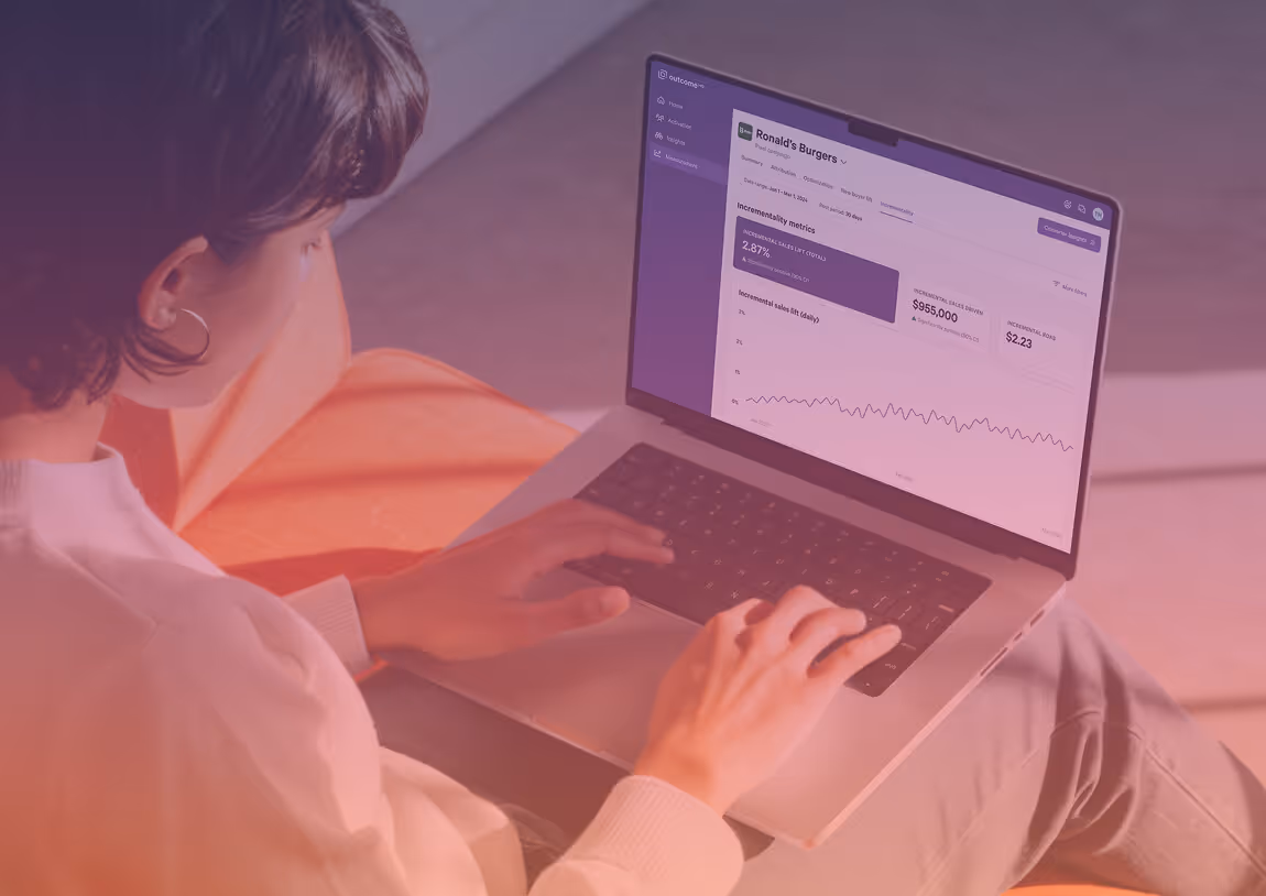 woman looking open roles at attain on laptop