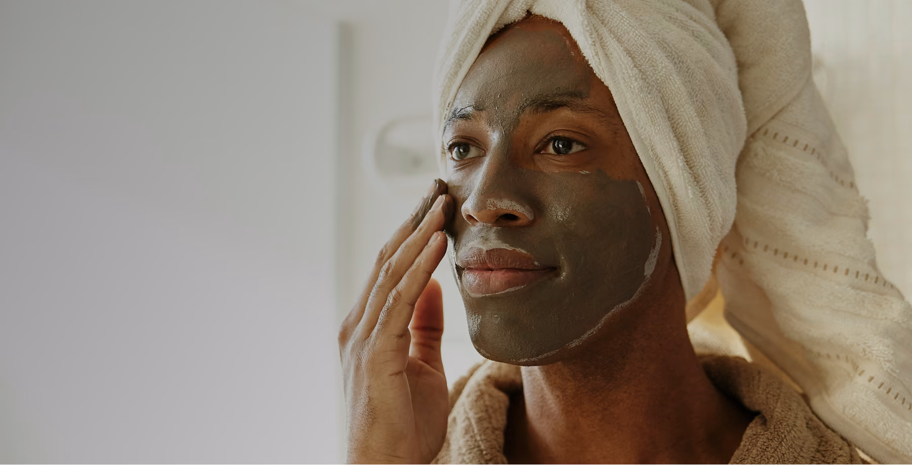 woman applying face cream