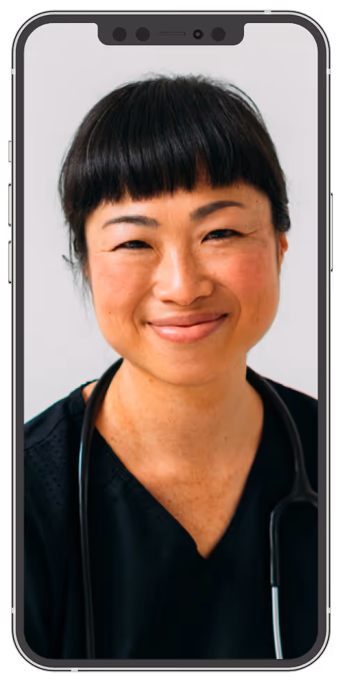 Smiling female healthcare professional wearing black scrubs and a stethoscope, visible on a smartphone screen.