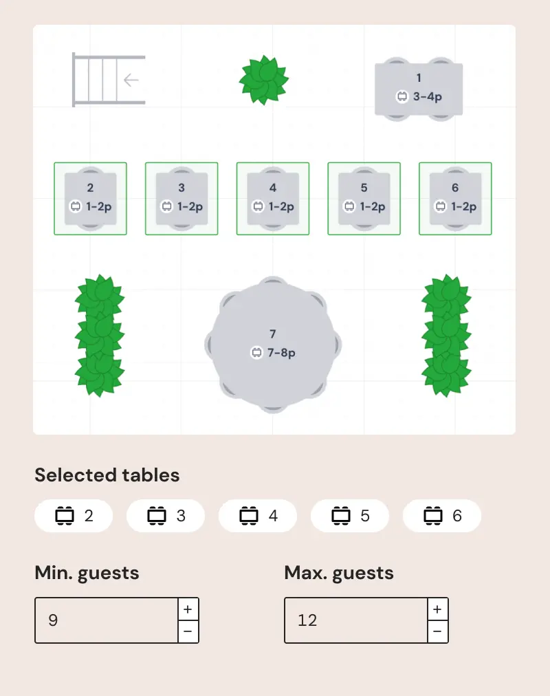 A layout of several tables and chairs arranged to maximize seating capacity for multiple groups.