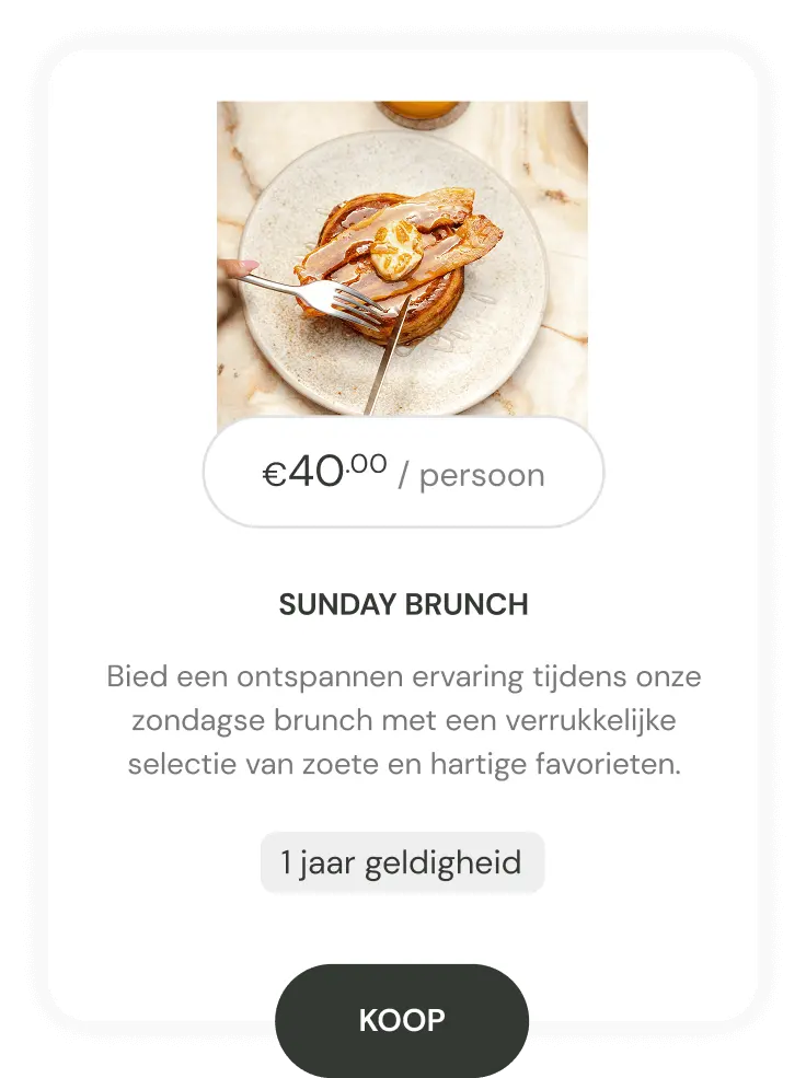 Plate with brunch dish of bacon and egg on a pastry, hands cutting with fork and knife.