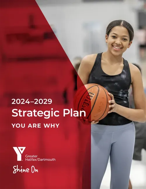 Cover of YMCA of Greater Halifax Dartmouth 2024-2029 Strategic Plan with young teen holding basketball and smiling at camera.