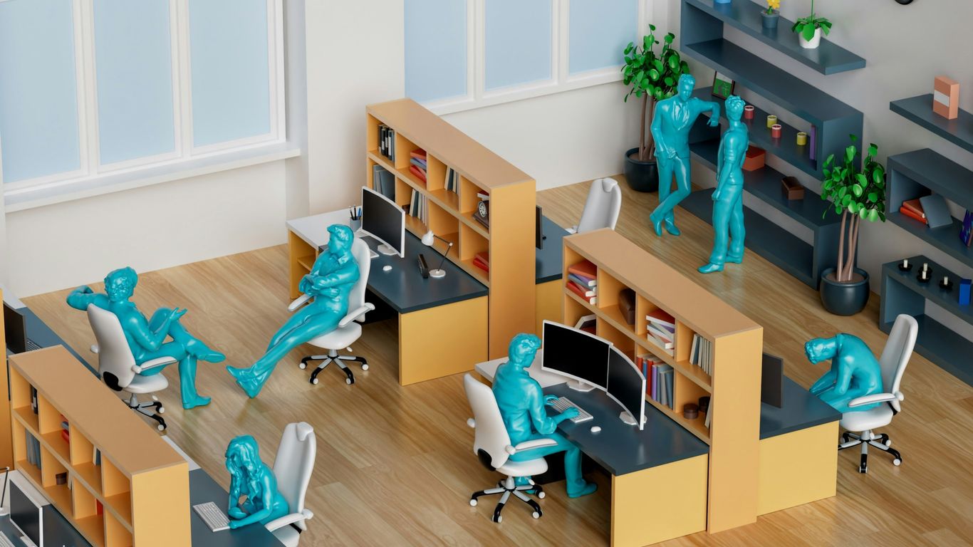 A group of desks with blue figures on them