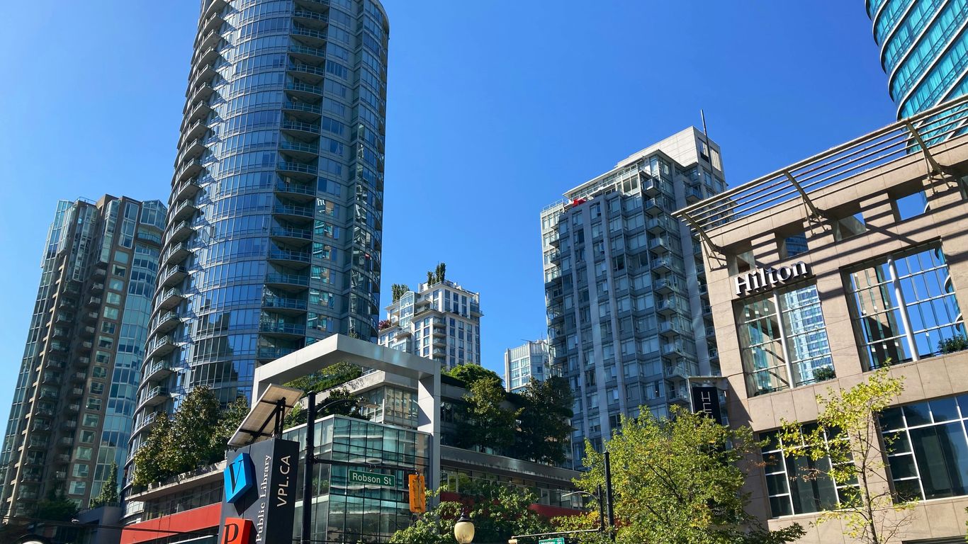 a group of tall buildings sitting next to each other