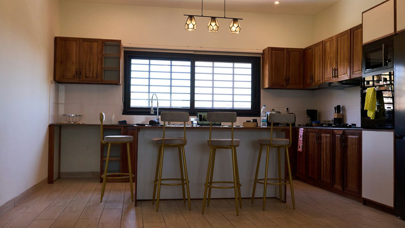 Modern kitchen with island and bar stools