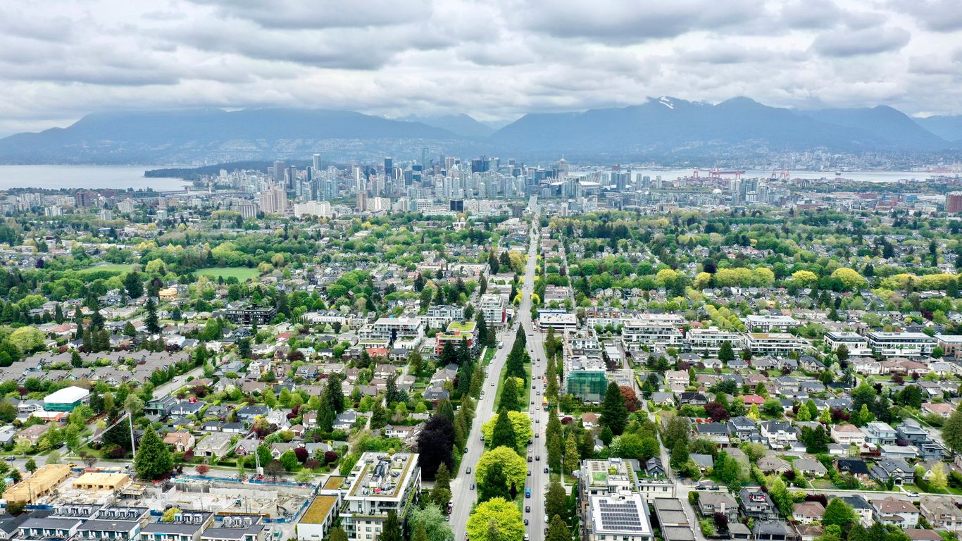 a city with many buildings and trees