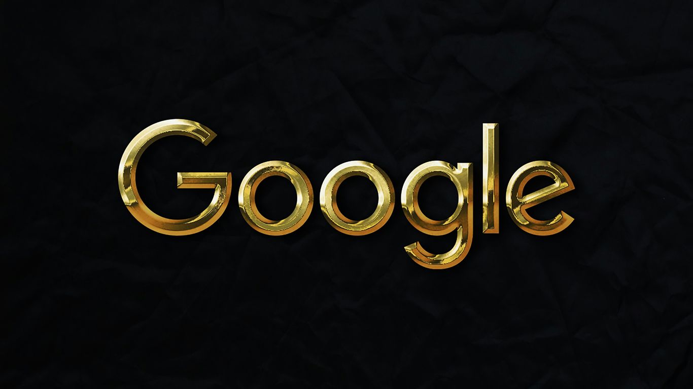 a gold google logo on a black background