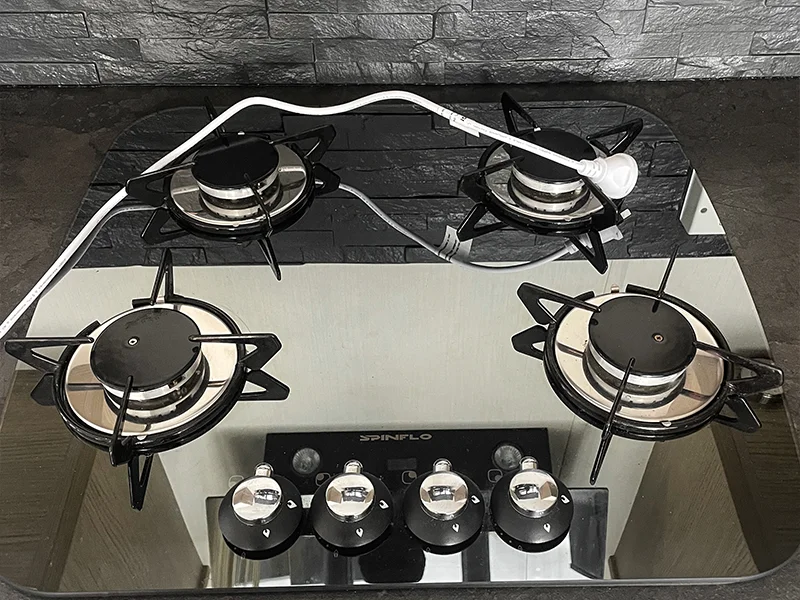 A partially installed gas cooktop in a motorhome