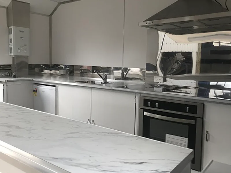 A fresh install of food truck kitchen, featuring a gas cooking system